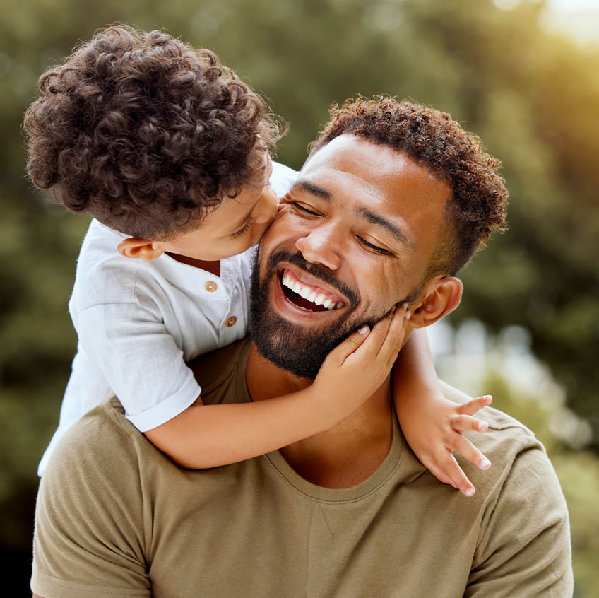 son-kissing-dad